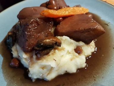 The final veg au vin with celeriac sitting on a bed of mashed potatoes.